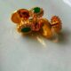 Flower Shaped Green Stone with Zircon Buttons